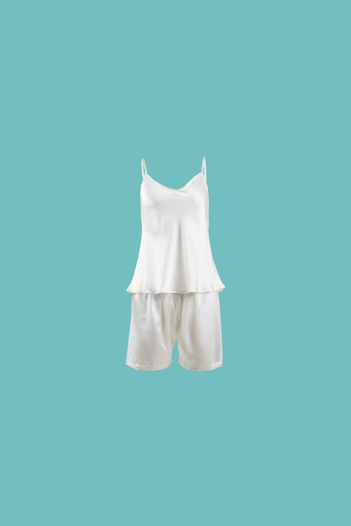 Ameline Ava Pearly White lustrious 100% Mulberry Silk Camisole Short Pajama Set, against blue background